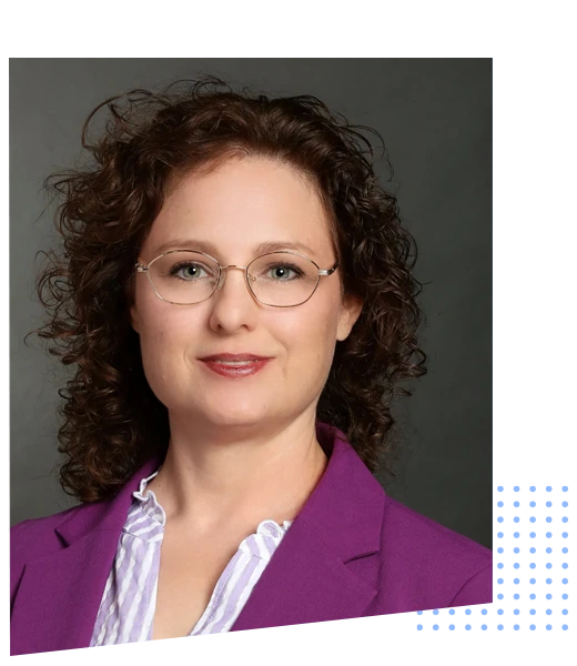 A professional headshot photo of chiropractor Michelle Freeze